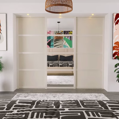 Cashmere shaker sliding wardrobe doors in a modern bedroom with a mirror and solid door combination